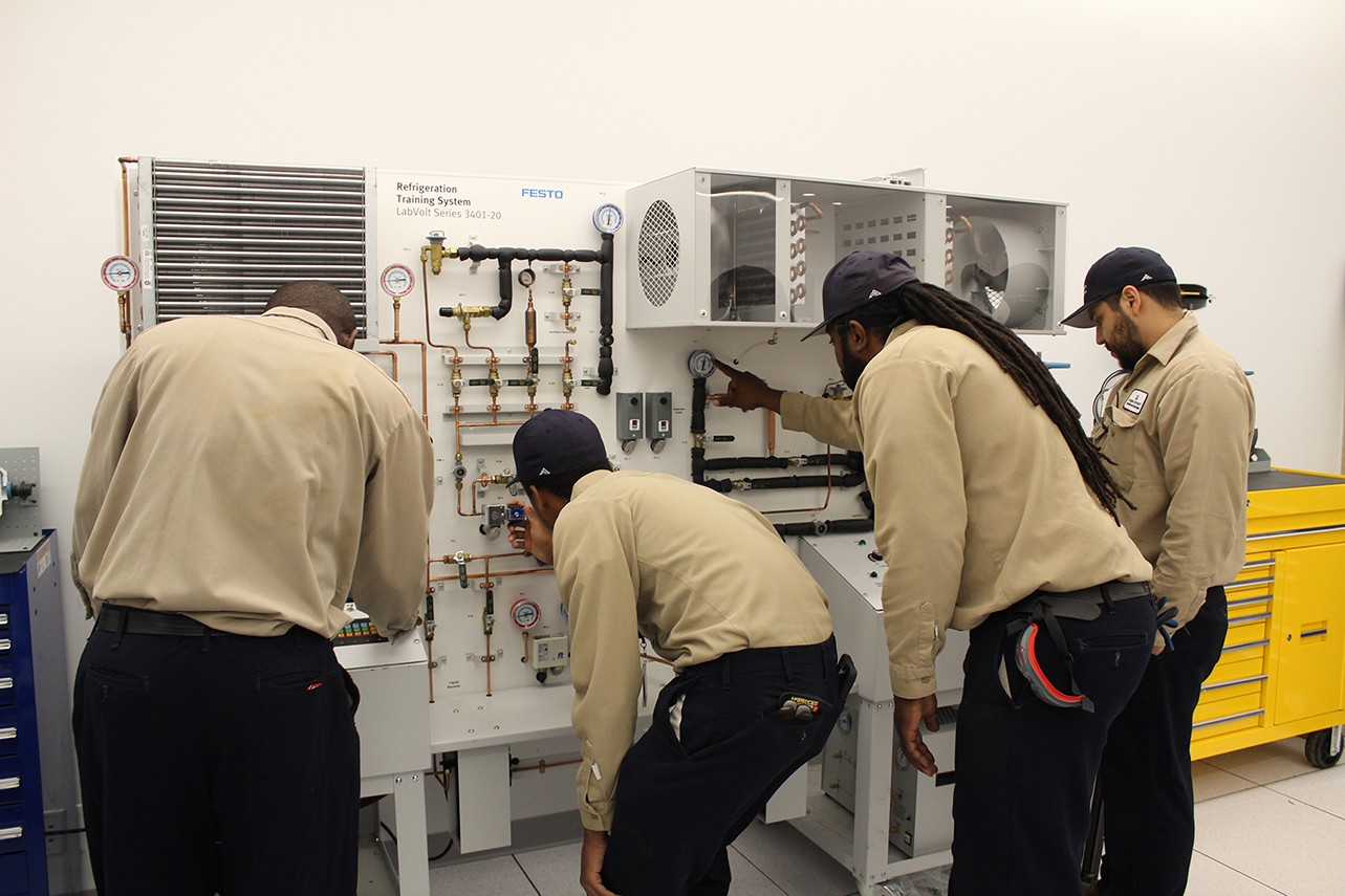 Apprentices (l to r) Evans Ampofo, Gary Hamilton, Keith DeFreitas, and Alphonso Espinoza receiving hands-on classroom training in the Studebaker Building at Columbia’s Manhattanville Campus. Apprentices (l to r) Evans Ampofo, Gary Hamilton, Keith DeFreitas, and Alphonso Espinoza receiving hands-on classroom training in the Studebaker Building at Columbia’s Manhattanville Campus.