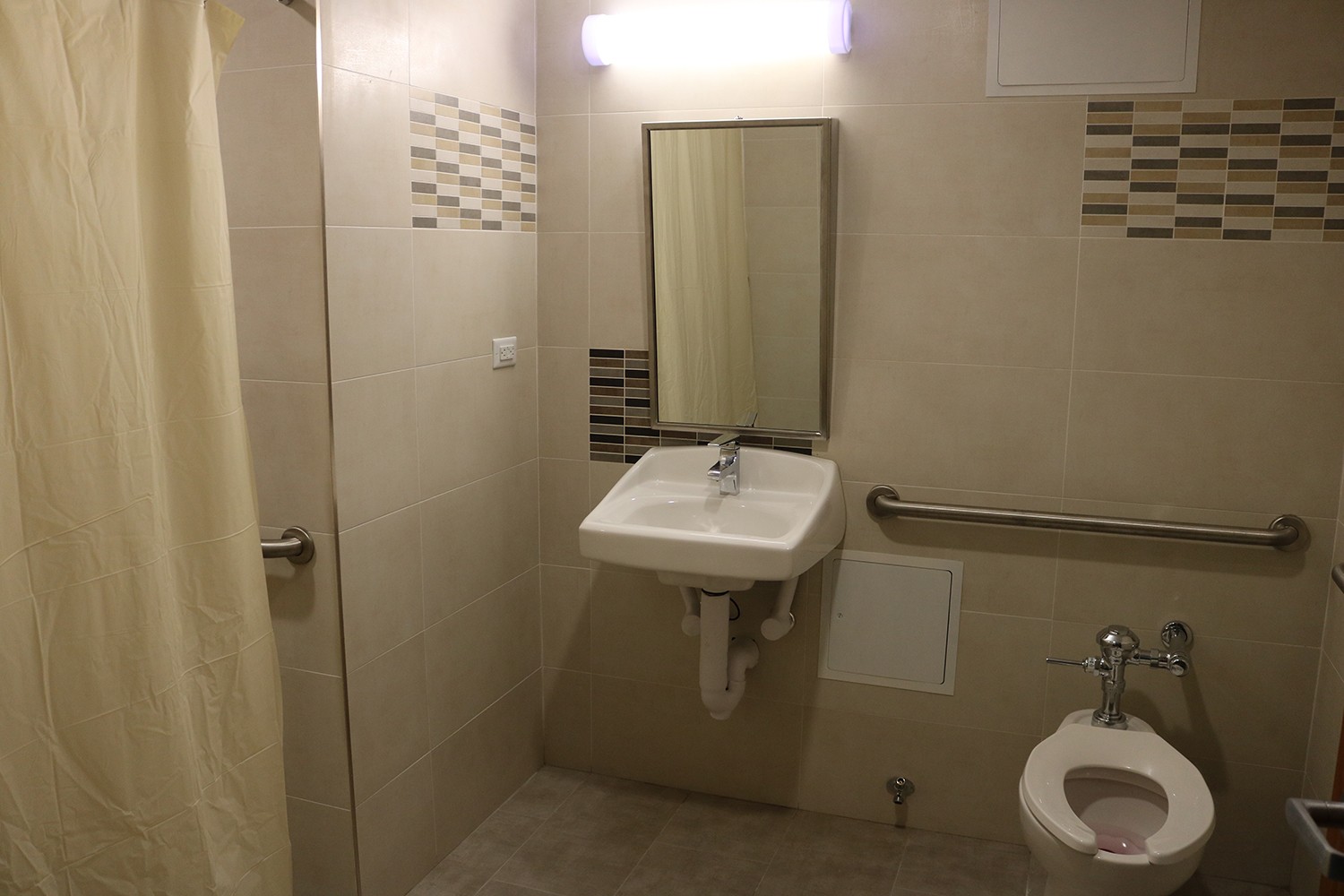 Accessible rooms with private ADA restrooms were created on floors 7 through 13 in Carman Hall. Accessible rooms with private ADA restrooms were created on floors 7 through 13 in Carman Hall.