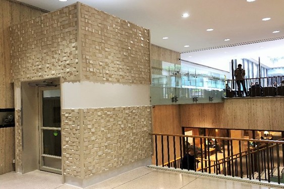 A new lift connects the the lobby and atrium levels of the International Affairs Building.