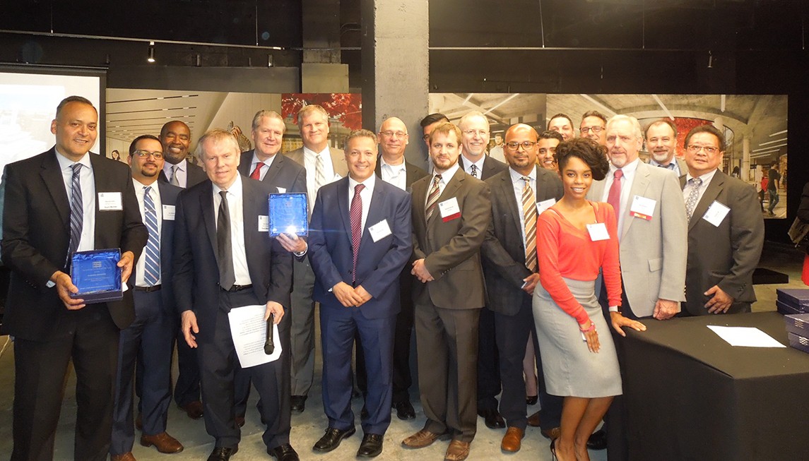 Members of Columbia University Facilities and Operations’ Manhattanville Development Group join with Lendlease and other professional service partners to accept the Best Academic Research Project Award for the Jerome L. Greene Science Center from the Greater New York Construction User Council. 