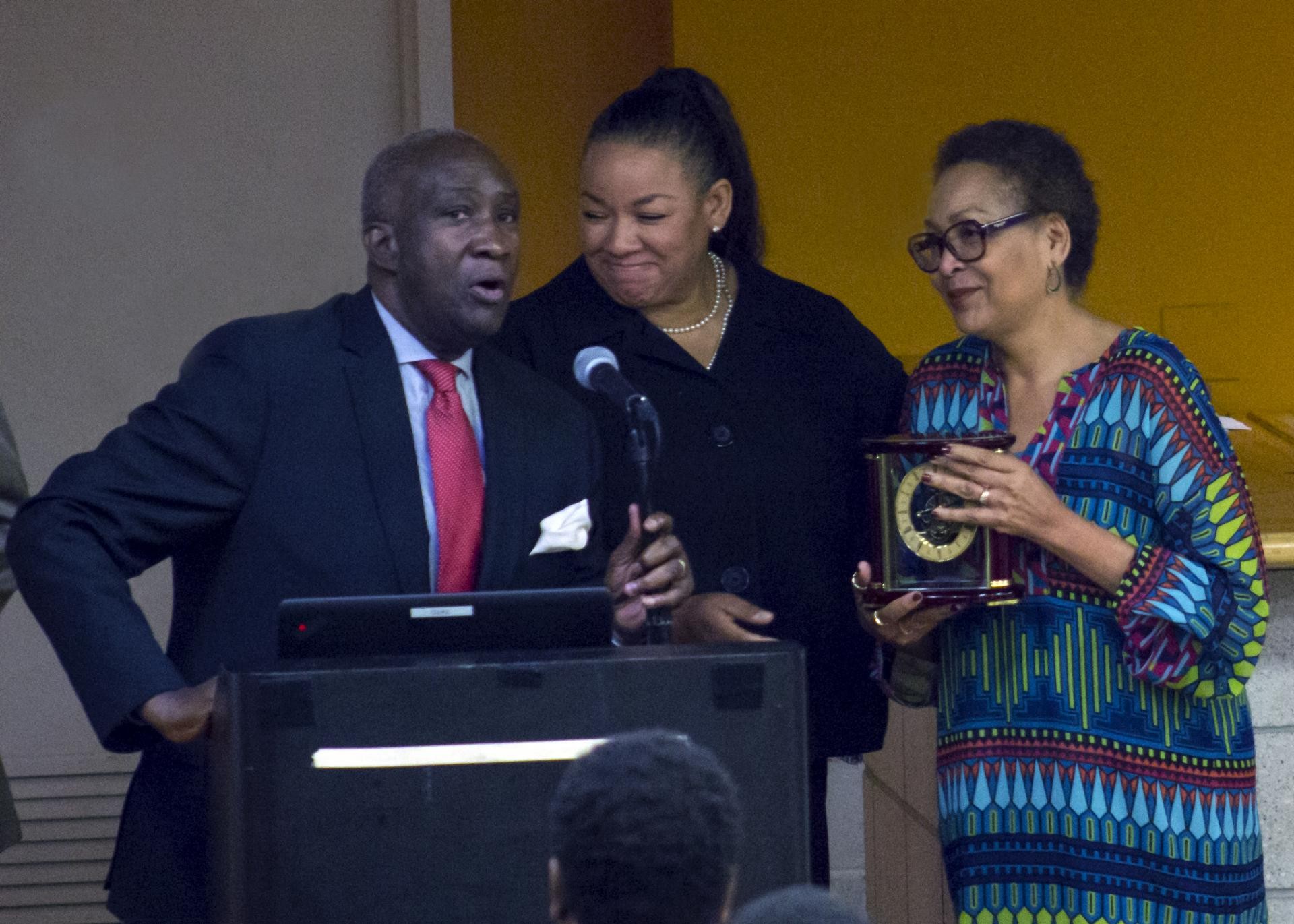 Lloyd Williams, president and CEO of the Greater Harlem Chamber of Commerce, presenting the Outstanding Professional Achievement Award to La-Verna Fountain (right).