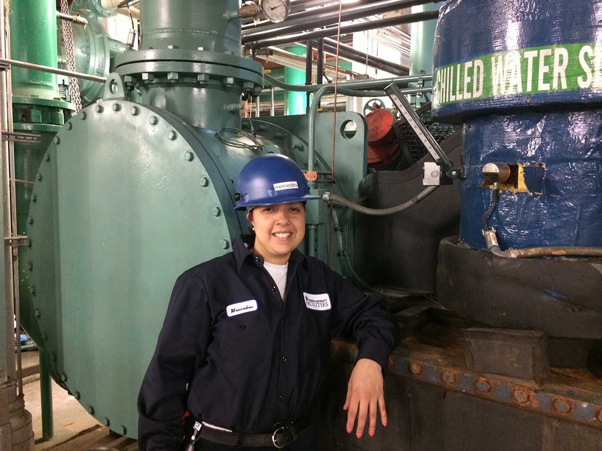 Mercedes Santana, mechanic trainee, at the chiller plant on Columbia’s Morningside campus. Mercedes Santana, mechanic trainee, at the chiller plant on Columbia’s Morningside campus.