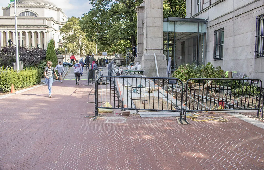 A Lower Campus accessibility ramp adjacent to Hamilton Hall will replace the temporary metal ramp that had been in place previously and improve access between residential and academic buildings.
