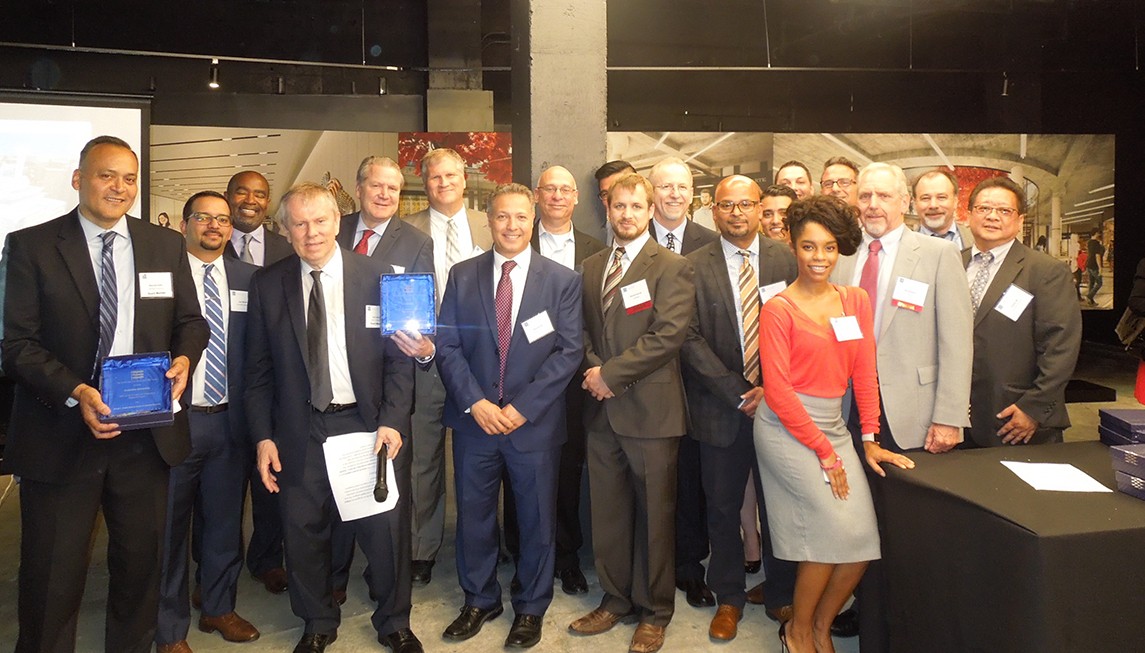 Members of Columbia University Facilities and Operations’ Manhattanville Development Group join with Lendlease and other professional service partners to accept the Best Academic Research Project Award for the Jerome L. Greene Science Center from the Greater New York Construction User Council.